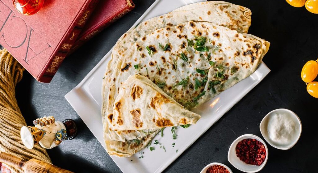 white flatbreads served in a plate